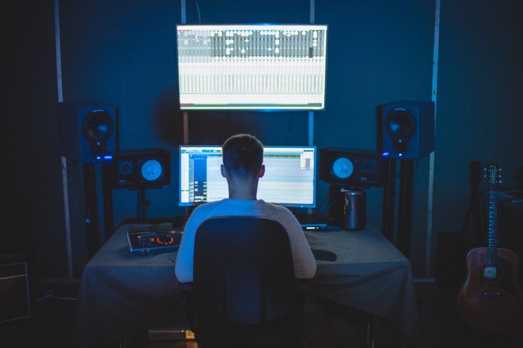 Audio engineer in home recording studio